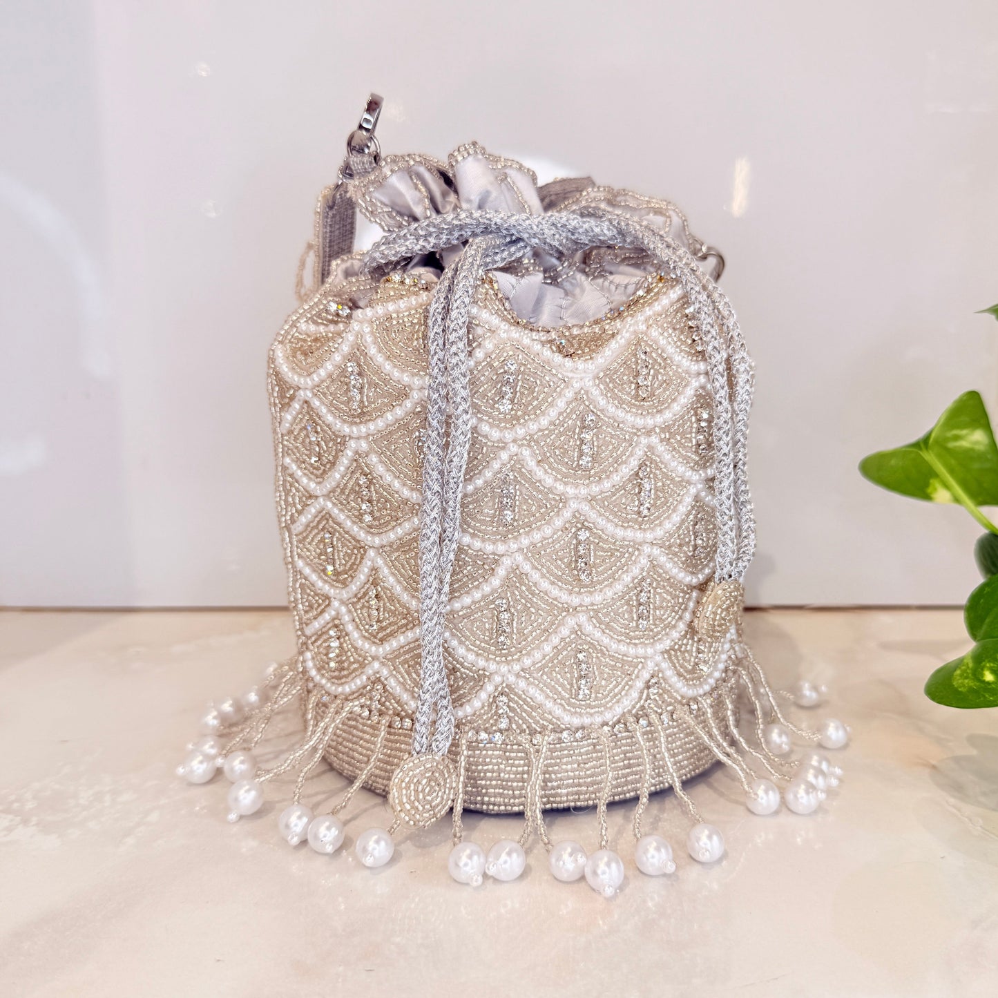 Snow Tassel Potli Bag