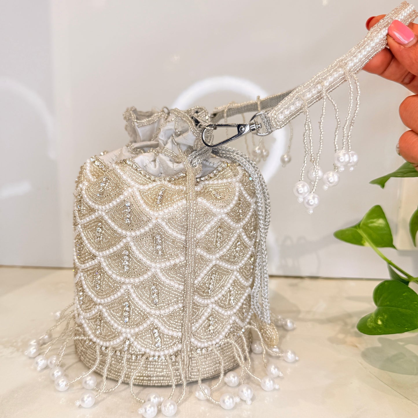 Snow Tassel Potli Bag