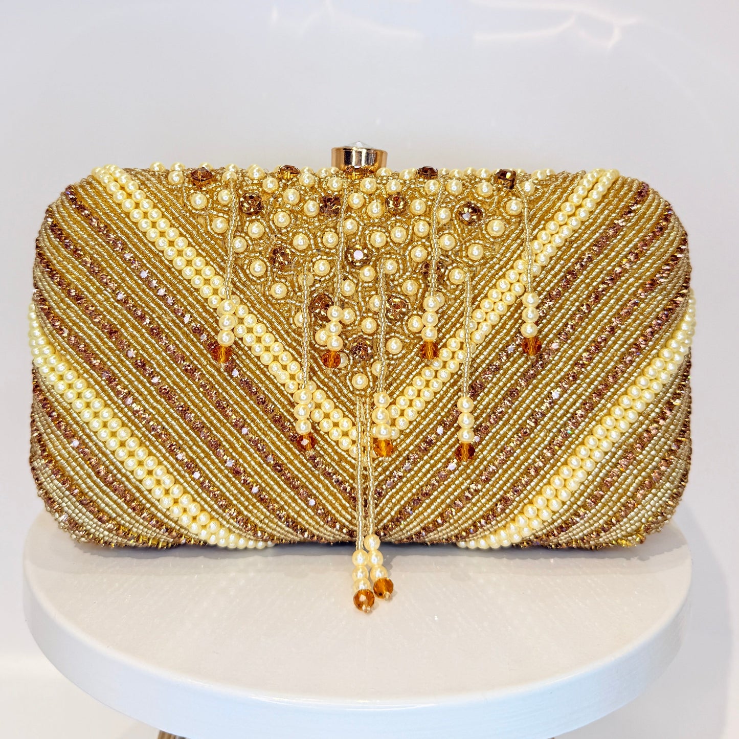 Ivara Tassel Clutch - Golden