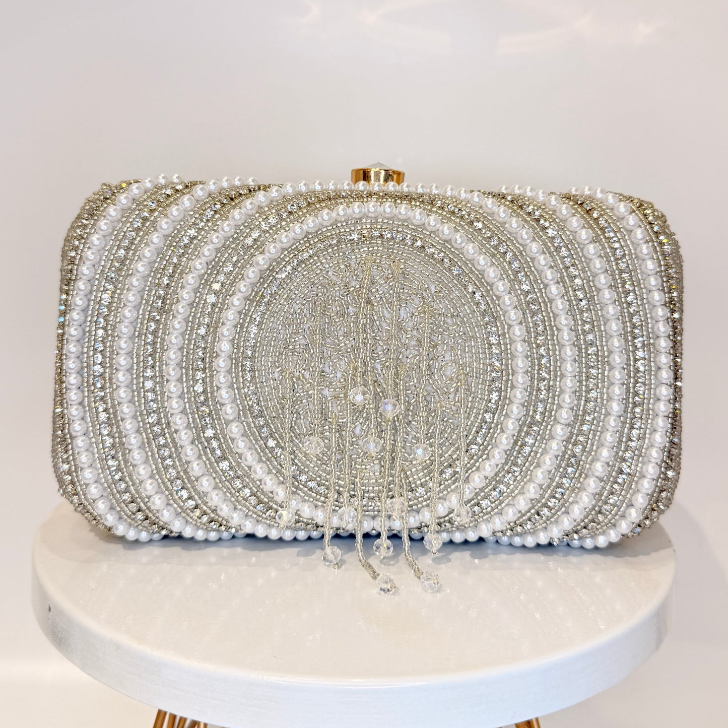 Ishya Silver Tassel Clutch