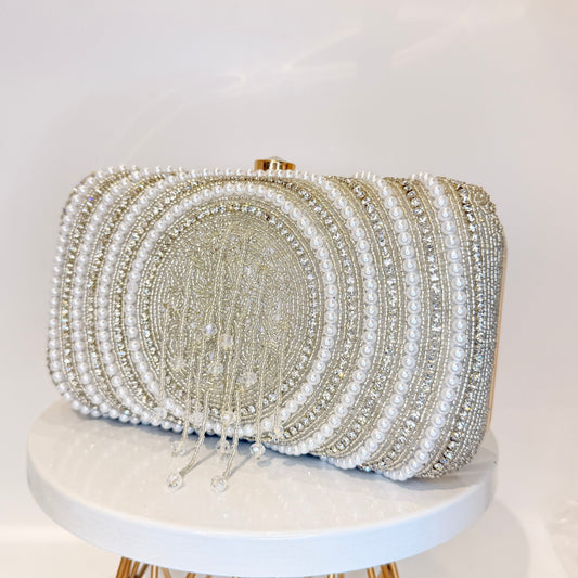 Ishya Silver Tassel Clutch