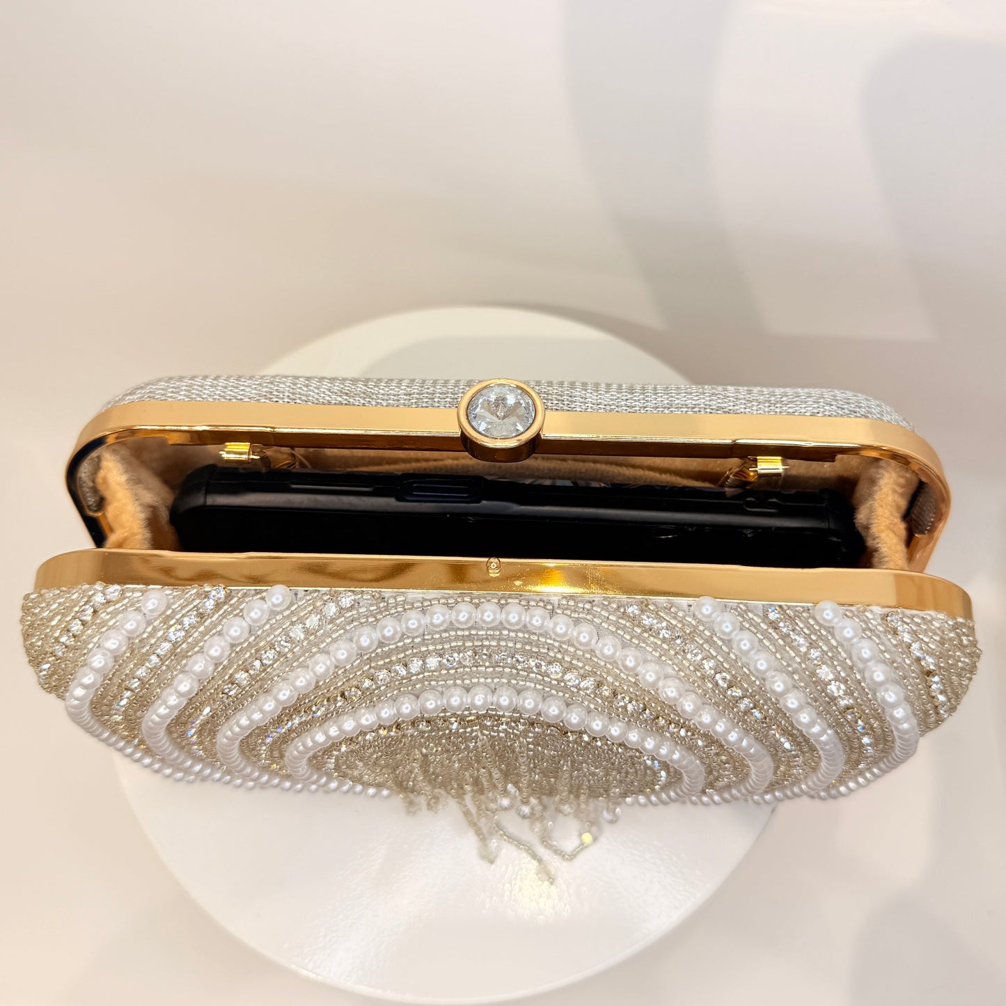 Ishya Silver Tassel Clutch