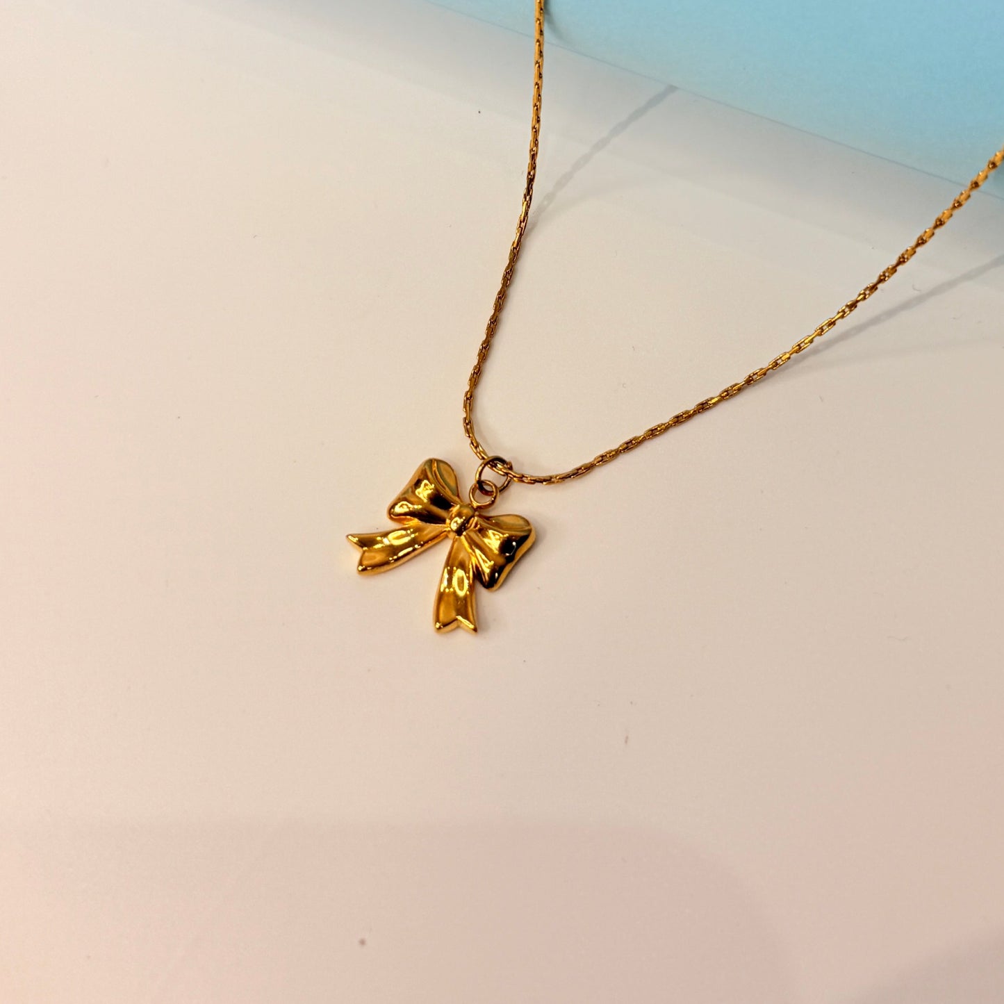 Golden Bow Pendant Necklace