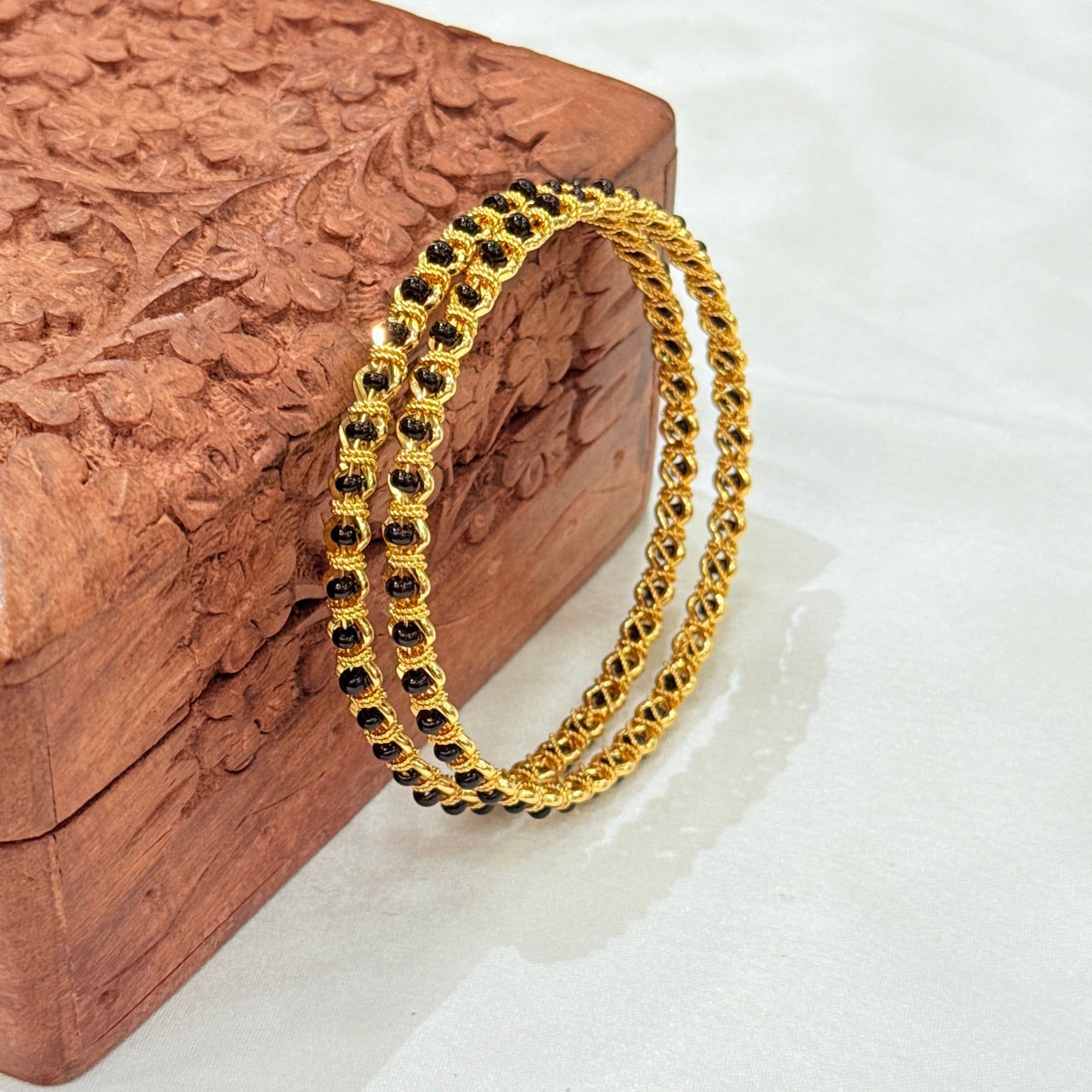 Rashi Black Bead Golden Bangle