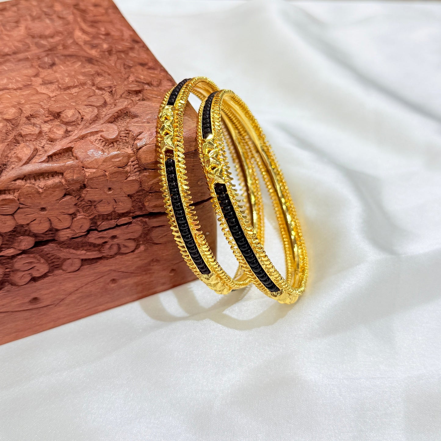 Revati Black Pirduka Golden Bangle