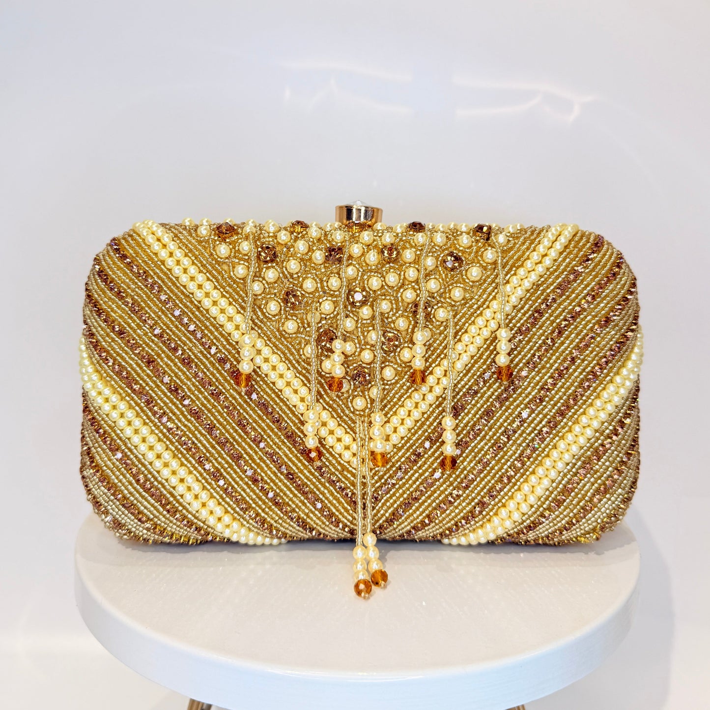 Ivara Tassel Clutch - Golden
