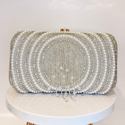 Ishya Silver Tassel Clutch