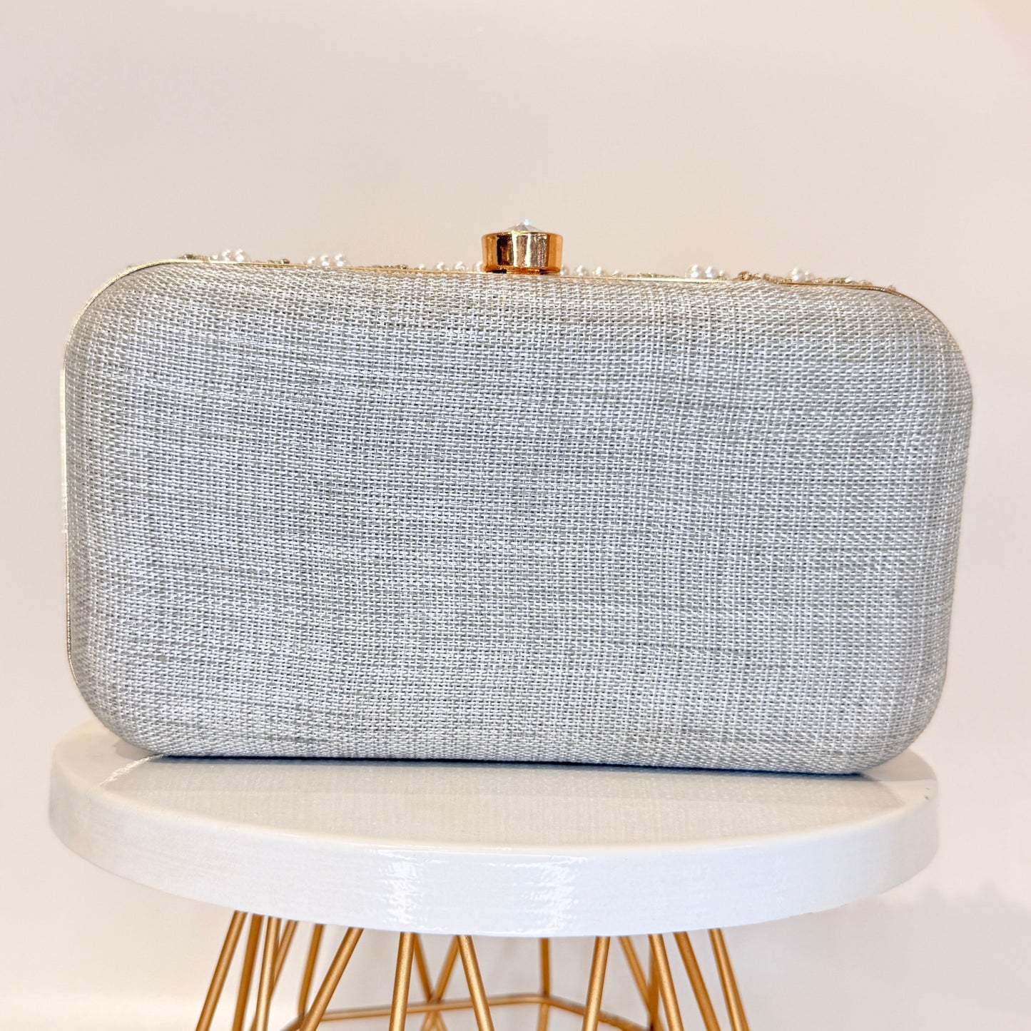 Ishya Silver Tassel Clutch