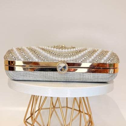 Ishya Silver Tassel Clutch