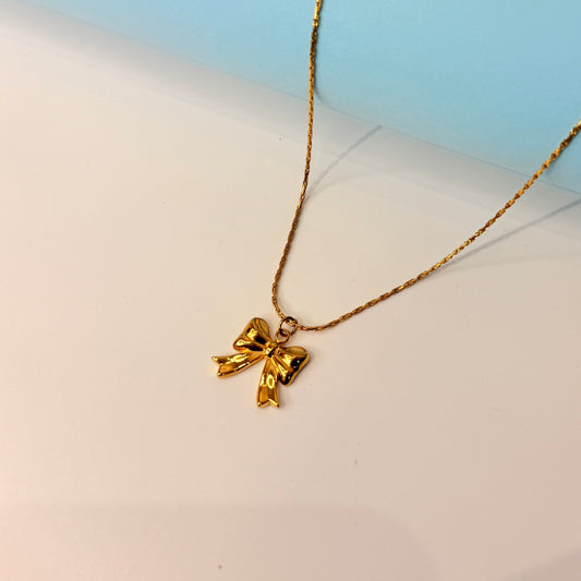Golden Bow Pendant Necklace