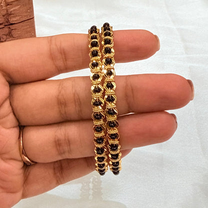 Rashi Black Bead Golden Bangle