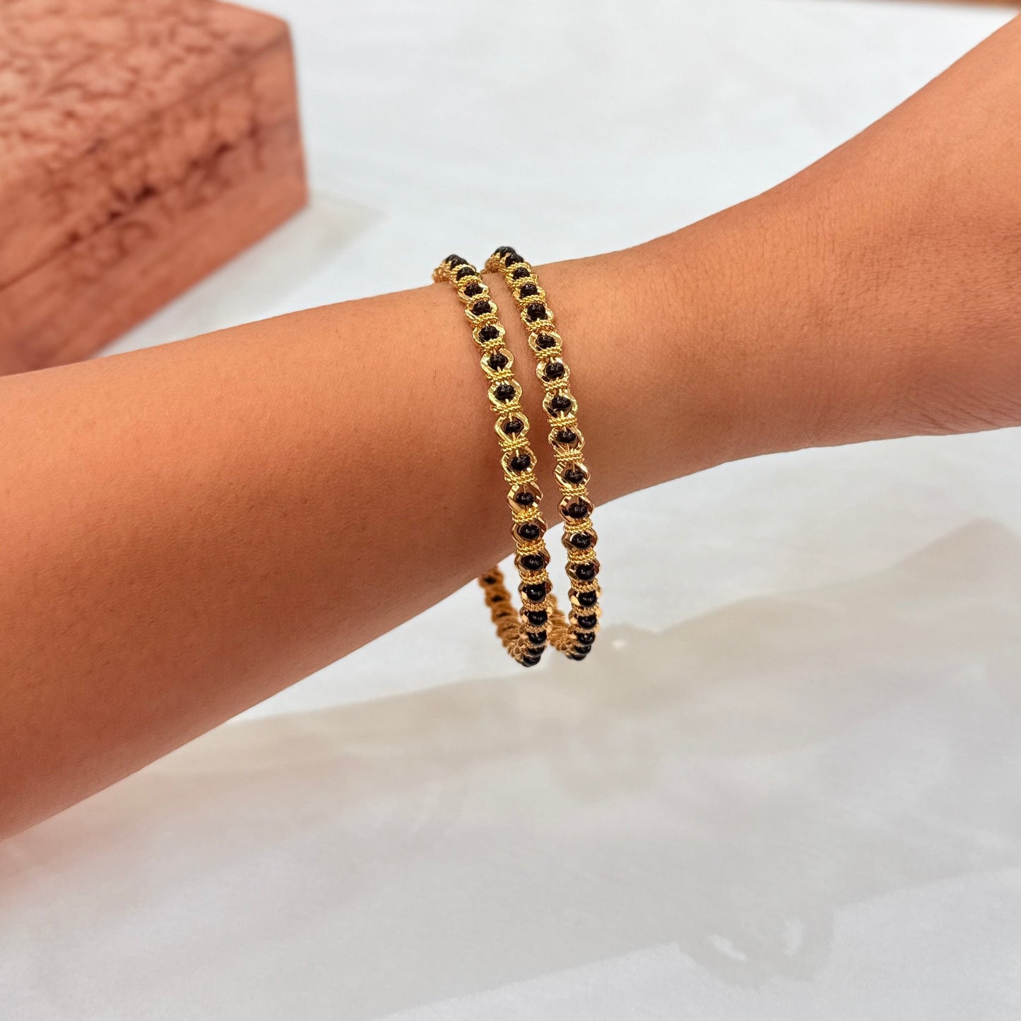 Rashi Black Bead Golden Bangle