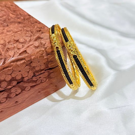 Revati Black Pirduka Golden Bangle
