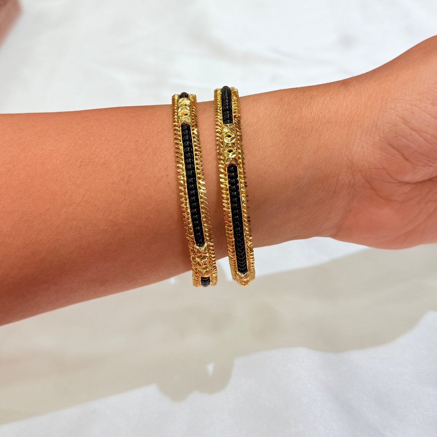 Revati Black Pirduka Golden Bangle
