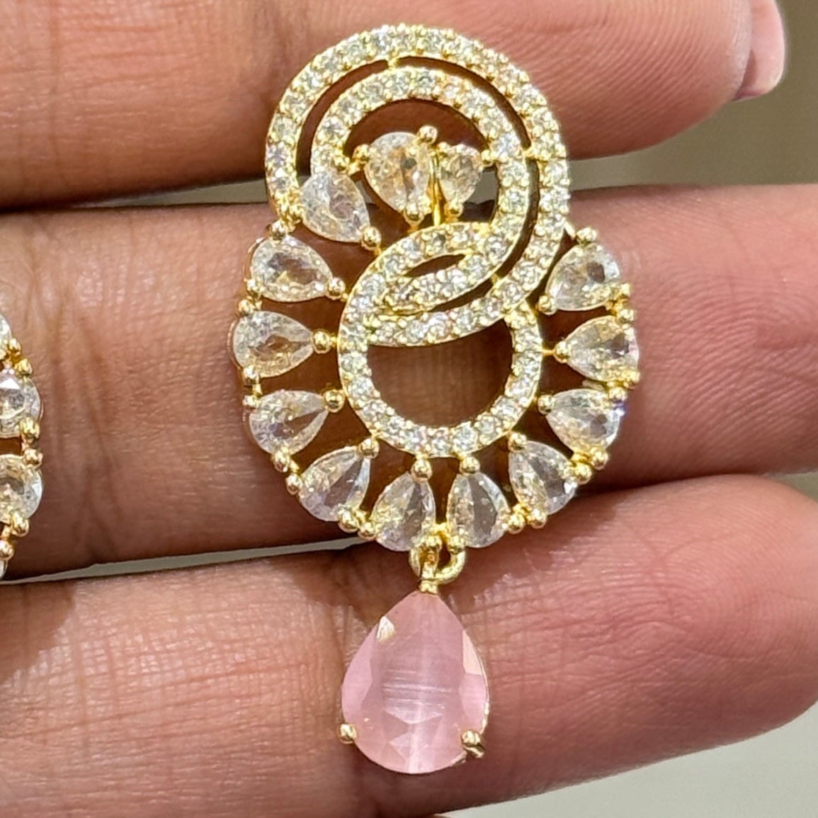 AD Golden earring with Pink Diamond